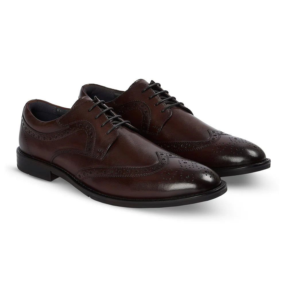 Pair of brown leather dress shoes on a light gray background